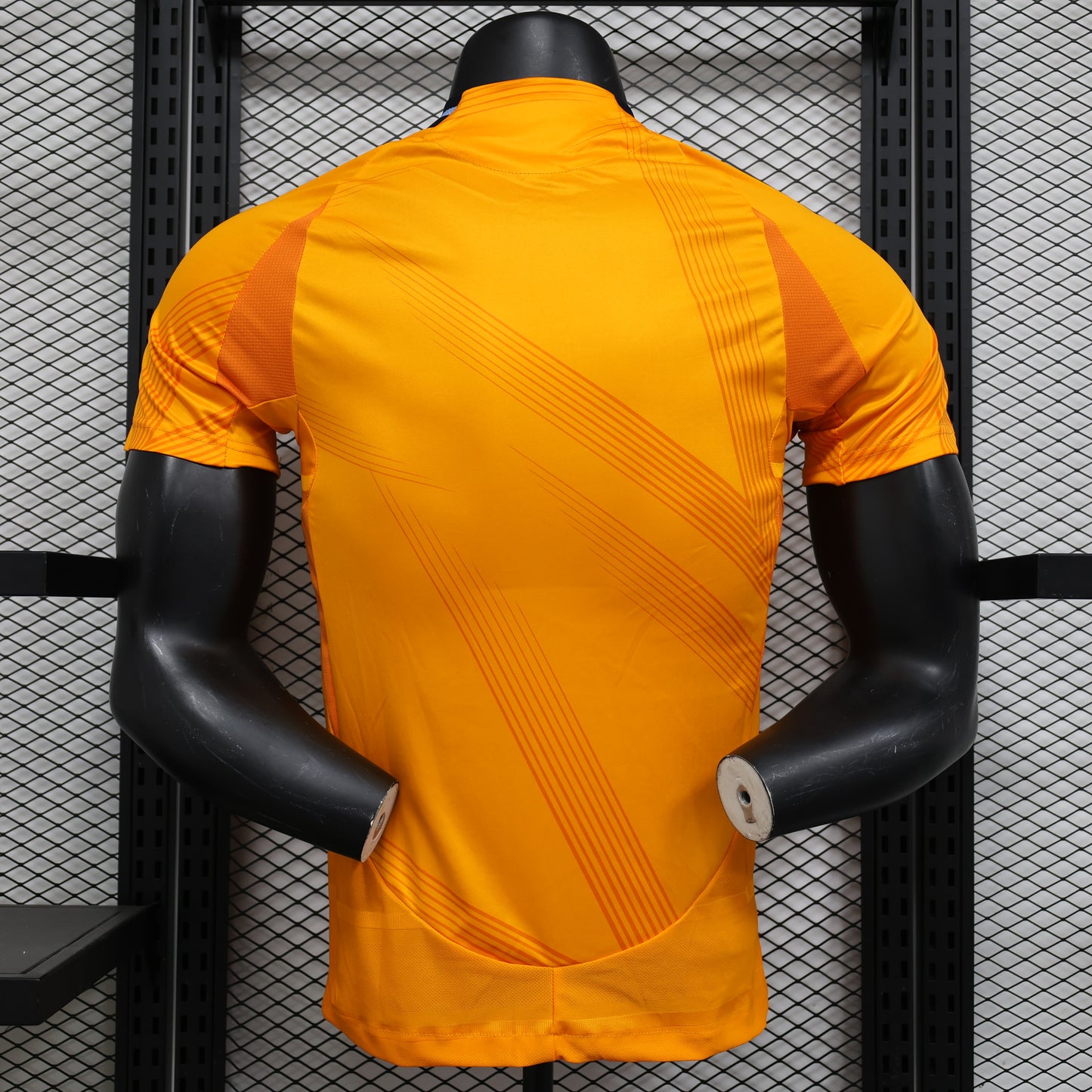 CAMISETA REAL MADRID NARANJA 24/25 HOMBRE (VERSIÓN JUGADOR)
