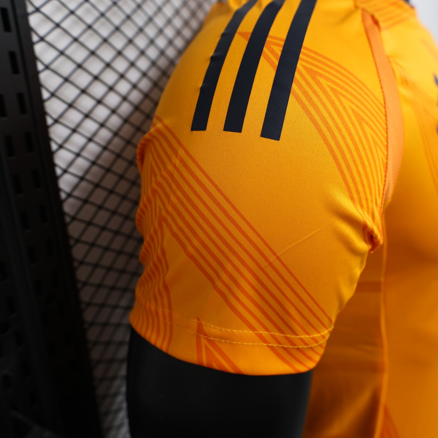 CAMISETA REAL MADRID NARANJA 24/25 HOMBRE (VERSIÓN JUGADOR)