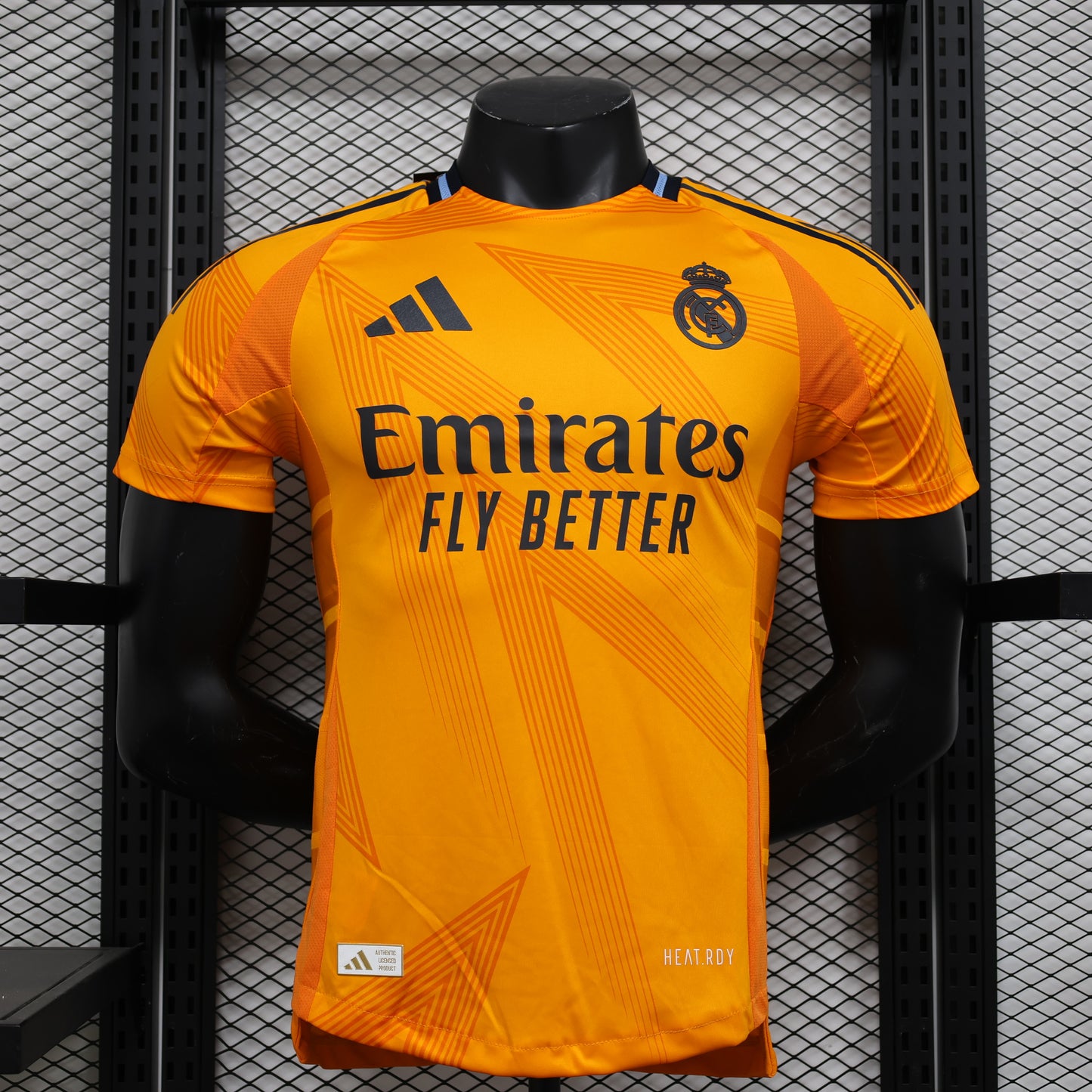 CAMISETA REAL MADRID NARANJA 24/25 HOMBRE (VERSIÓN JUGADOR)