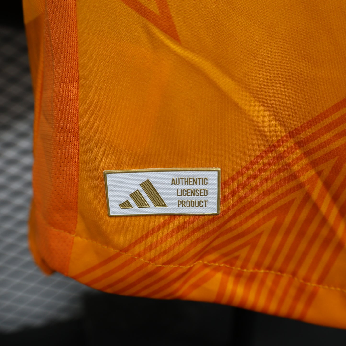 CAMISETA REAL MADRID NARANJA 24/25 HOMBRE (VERSIÓN JUGADOR)