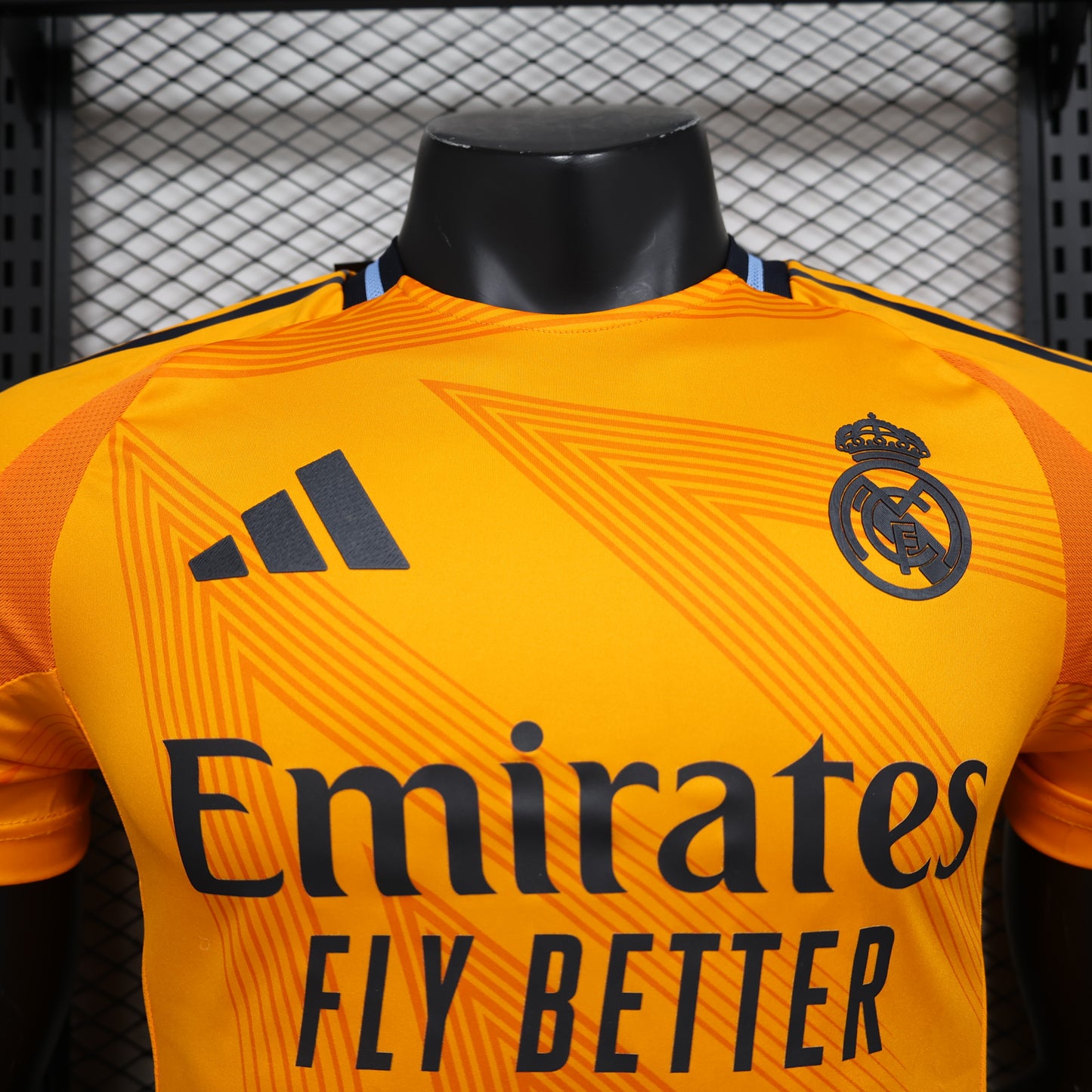 CAMISETA REAL MADRID NARANJA 24/25 HOMBRE (VERSIÓN JUGADOR)