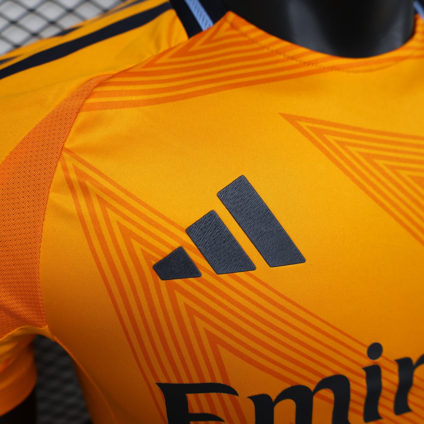 CAMISETA REAL MADRID NARANJA 24/25 HOMBRE (VERSIÓN JUGADOR)