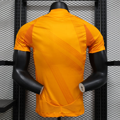 CAMISETA REAL MADRID NARANJA 24/25 HOMBRE (VERSIÓN JUGADOR)