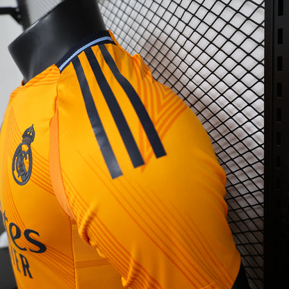 CAMISETA REAL MADRID NARANJA 24/25 HOMBRE (VERSIÓN JUGADOR)